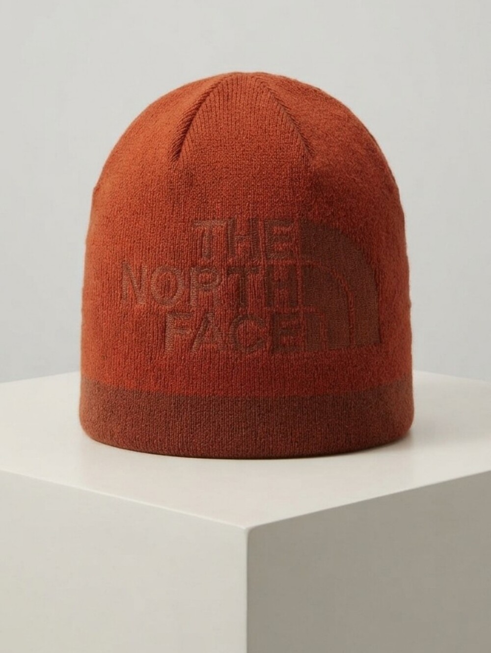The North Face Rust Orange Knit Beanie with Subtle Logo